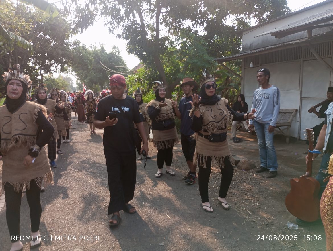 Polsek Grati Rayakan HUT RI ke-80 Bersama masyarakat kampung baru 